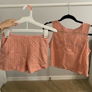 Light pink/coral tank top and shorts set.